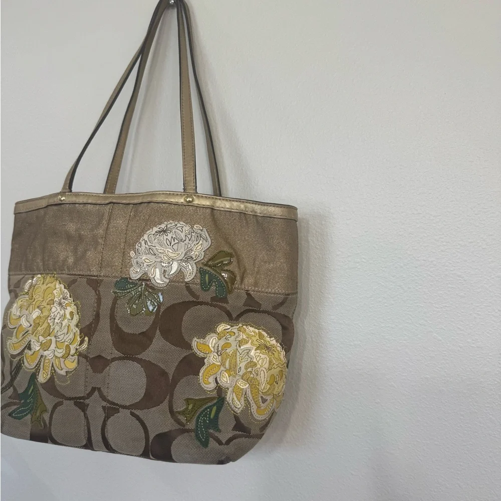 Coach chrysanthemum appliqué